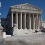 Federal court blocks Trump’s use of the Alien Enemies Act, halting expedited deportations over legal and human rights issues.