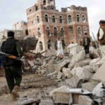 Smoke rises from Ras Issa port in Hodeida after reported US airstrike killing dozens of Yemeni civilians.