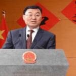 Chinese envoy Xie Feng urges U.S.-China unity against war and AI threats to global peace during peace anniversary reception.