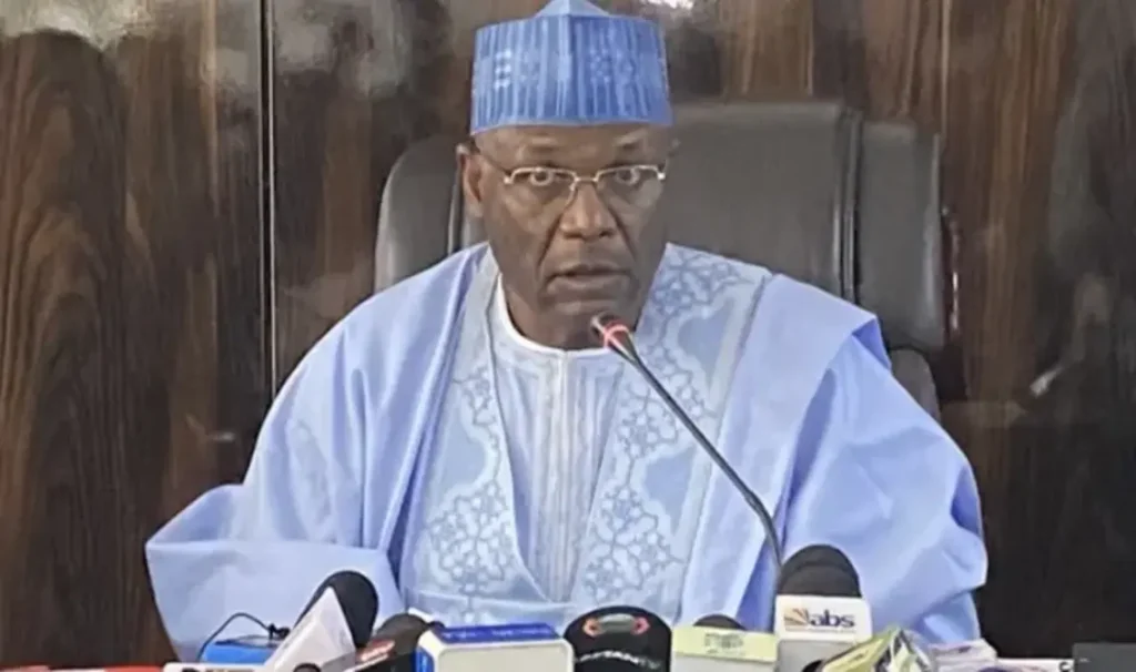 INEC Chairman Mahmood Yakubu announces 2026 Ekiti and Osun governorship elections schedule at Abuja briefing.