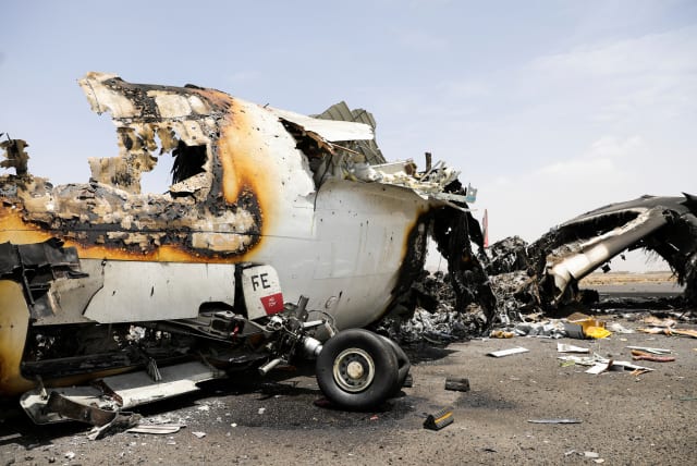 Israeli airstrike explosion damages aircraft on Sanaa Airport tarmac during May 2025 military offensive in Yemen.