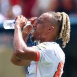 Players and coaches adjust to furnace-like heat during intense summer matches across U.S. host cities.