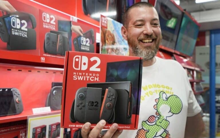 Gamers testing Nintendo’s new Switch 2 console with updated features and multiplayer functions during product launch event.(Photo by Kazuhiro Nogi/AFP)