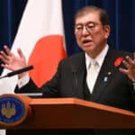 Japanese Prime Minister Shigeru Ishiba speaks after upper house election defeat amid rising political tension.