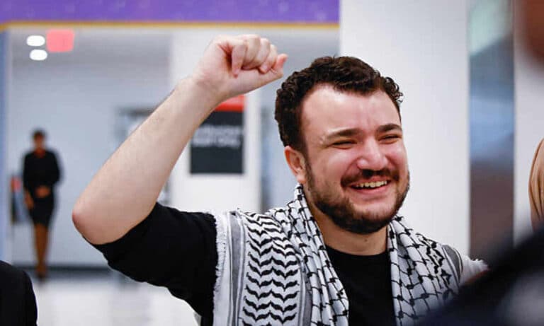 Columbia student Mahmoud Khalil exits Louisiana detention center after release, suing Trump officials for unlawful imprisonment and political targeting.