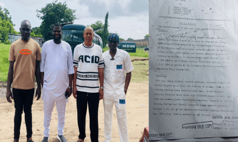 Freed Nigerian technician, Kolawole Oladeji, stands outside prison gates after 22 years behind bars on wrongful conviction