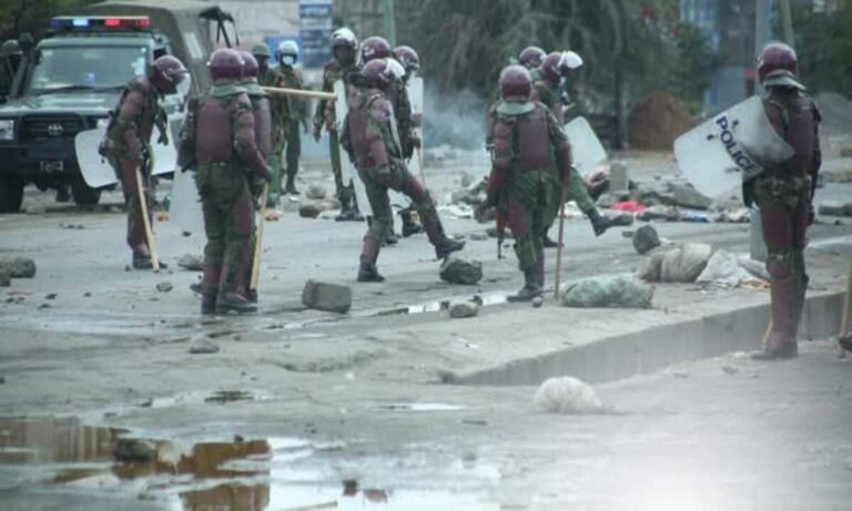 Kenyan riot police clash with protester during Saba Saba demonstrations in Kisii on July 7, 2025