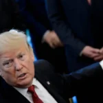 President Trump speaks with reporters aboard Air Force One during press pool controversy involving the Wall Street Journal media access restriction