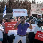 Air Canada strike disrupts flights as attendants protest at Toronto Pearson Airport during peak summer travel season.