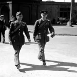 British troops inspecting smuggled arms during the final months of the Palestine Mandate in 1948 amid Britain’s weapons embargo enforcement.