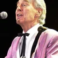 Col Joye performs live on stage during the peak of his music career in Australia’s rock and roll era.