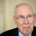 Jim Lovell Apollo 13 commander in NASA astronaut suit