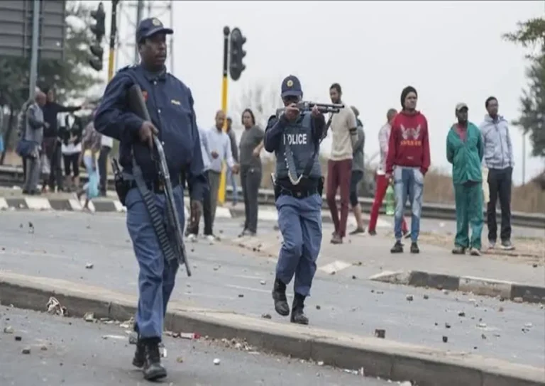 Police confront residents in Makhanda after illegal shack demolitions during violent protest leaving municipal buildings damaged.