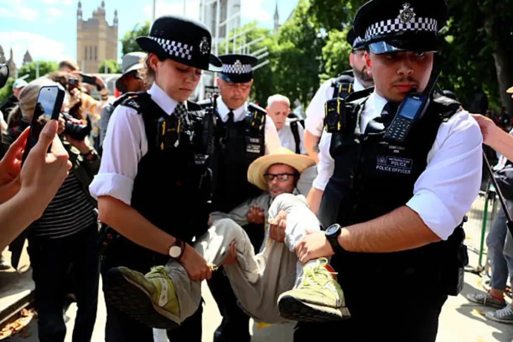 Police Remove Protesters at London Rally Against Palestine Action Terrorist Designation | Epicstorian News Police officers remove Palestine action protesters during the London ‘Lift The Ban’ pro-Palestine rally on August 9, 2025