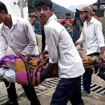 Volunteers and disaster teams rescue victims after rain-driven torrents in Kishtwar