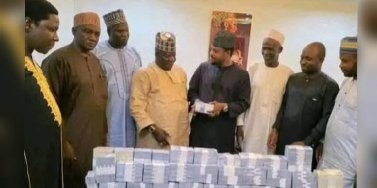 Adamawa lawmaker Jafar Abubakar hands out N224 million cash in mint notes to youths and friends.
