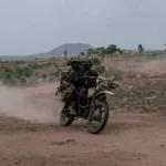 Armed insurgents attacked a Nigerian military barracks in Banki, forcing soldiers to retreat across the border.