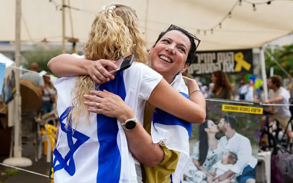 Israel and Hamas sign Gaza ceasefire and hostage swap deal in major diplomatic breakthrough | Epicstorian News Crowd in Hostage Square Tel Aviv marking Israel and Hamas ceasefire as aid trucks queue at crossing.