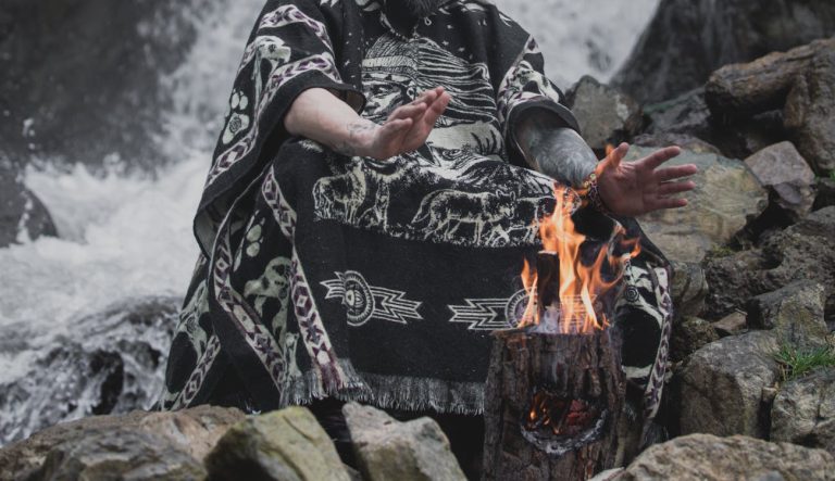 African Fire Heat Therapy Methods Drive Global Interest in Safe Healing Techniques | Epicstorian News Indian healer demonstrating heat therapy with fire and heated stones as part of traditional wellness practice.