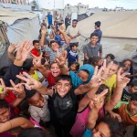 Ceasefire enables Gaza humanitarian aid delivery into blockaded areas, relief groups prepare mass distribution, but access remains contested