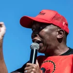 Economic Freedom Fighters supporters protest in Johannesburg after Julius Malema guilty verdict in firearm case