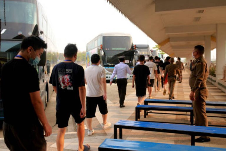 Escapees from Myanmar scam centre cross Moei River into Thailand during post-raid humanitarian evacuation