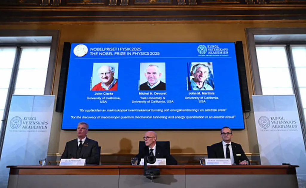 Nobel Prize awarded to quantum physics pioneers for macroscopic tunnelling discovery | Epicstorian News Quantum physics laureates Clarke, Devoret, and Martinis honored for their macroscopic tunnelling discovery in Stockholm, Sweden, on October 7, 2025.