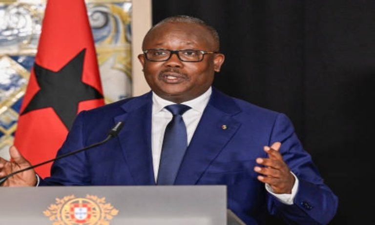 Embalo stands at a podium addressing supporters during the Guinea-Bissau election campaign in the capital Bissau