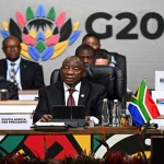 World leaders stand for a group photo at the G20 summit as diplomatic tensions shape global climate policy commitments