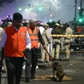 Security officials inspect charred remains of vehicles at Red Fort blast site in India’s capital Delhi.