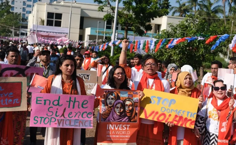 Supporters at an international rally demand stronger global measures to prevent sexual violence and improve funding for survivors.