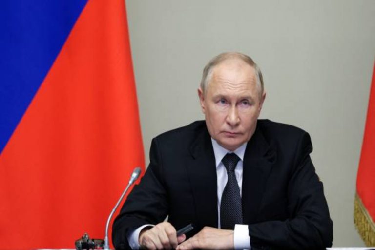 Russian President Vladimir Putin amid legal confrontation involving ICC judges and prosecutors over an international arrest warrant.