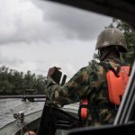 Nigerian Army troops conduct Niger Delta oil theft operations dismantling illegal refining sites and recovering stolen petroleum products