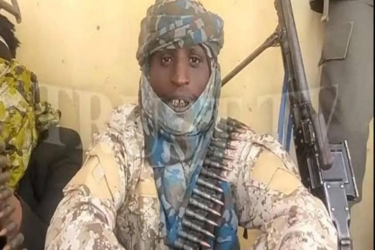 Nigeria Terrorist Leader Bello Turji Confirms Meetings With Zamfara Officials, Urges Arrests of Former Governors | Epicstorian News Nigeria Terrorist Leader Bello Turji with military and community leaders during conflict zone in Zamfara peace negotiation context.