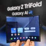 Samsung Galaxy Z TriFold displayed partially unfolded showing the 10-inch inner display and hinge detail in studio lighting.