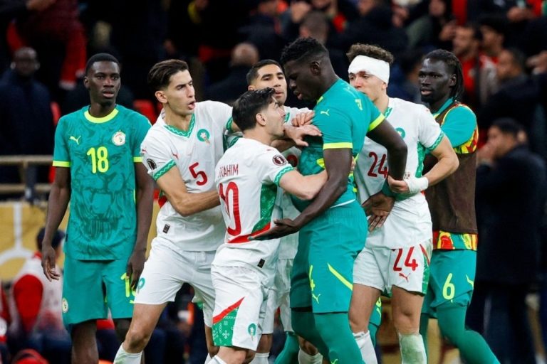 Senegalese fans scuffle with Moroccan security during AFCON final 2026 in Rabat stadium.