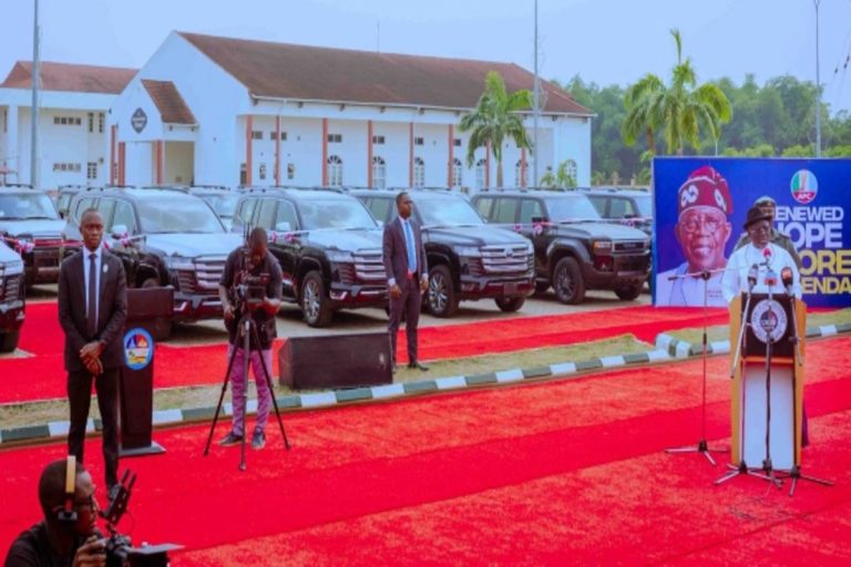 Governor Oborevwori handing over a Toyota SUV to a Delta monarch during official ceremony in Asaba.