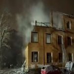 Ukrainian rescuers work at damaged residential building in Kyiv after Russian drone and missile attack overnight