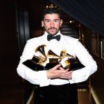 Bad Bunny holding Grammy trophy after historic Album of the Year win