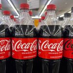 Coca-Cola bottles displayed on a store shelf in Greenbrae, California, February 10, 2026 during Q4 earnings reporting