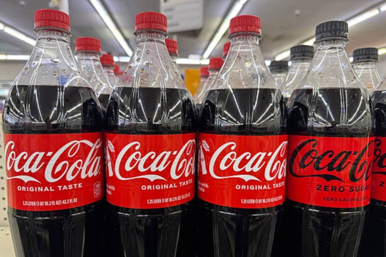 Coca-Cola bottles displayed on a store shelf in Greenbrae, California, February 10, 2026 during Q4 earnings reporting