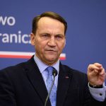 Polish Deputy PM Radosław Sikorski and Czech Foreign Minister Petr Macinka at joint press conference in Warsaw discussing territorial debt, February 16, 2026