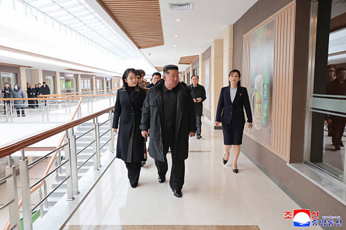 Kim Jong Un stands beside daughter Kim Ju Ae during North Korean rocket launcher test.