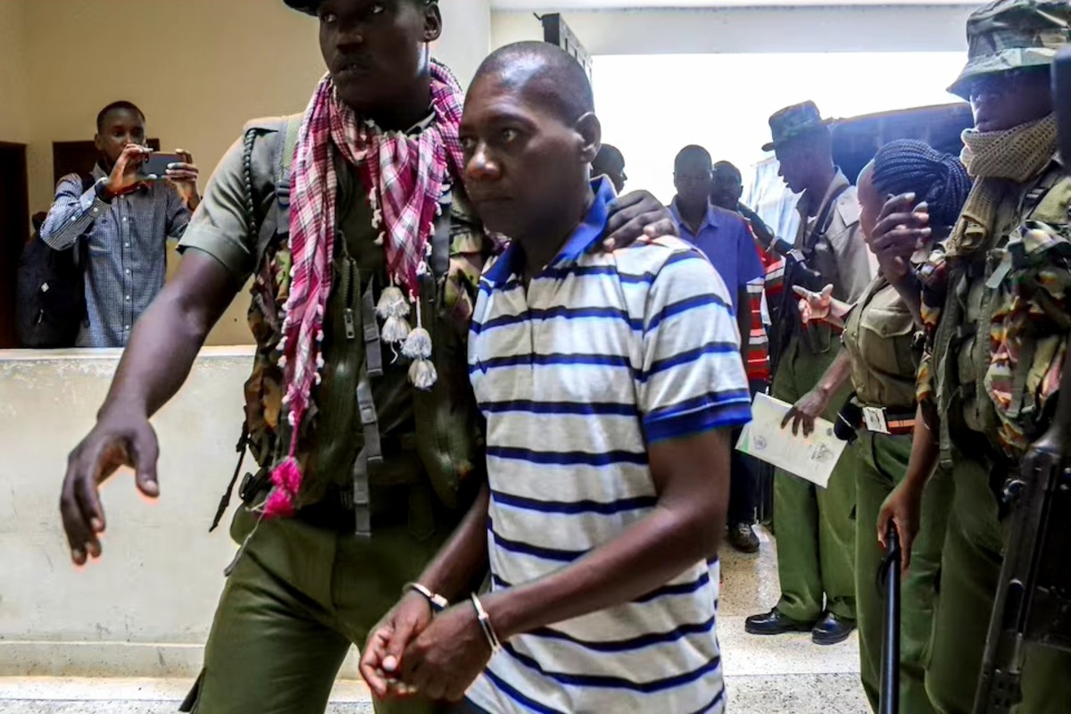 Kenyan cult leader Paul Mackenzie under police escort at court