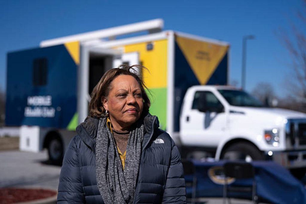 South Carolina State Rep. Rosalyn Henderson-Myers stands outside a mobile clinic offering MMR vaccines during the Spartanburg measles outbreak, February 2026