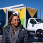 South Carolina State Rep. Rosalyn Henderson-Myers stands outside a mobile clinic offering MMR vaccines during the Spartanburg measles outbreak, February 2026