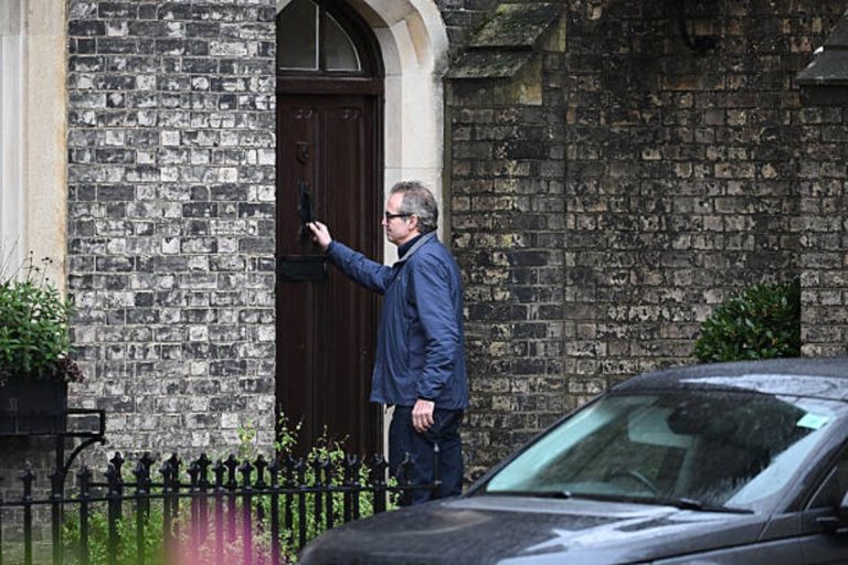 Metropolitan Police officers at a property linked to Peter Mandelson during Epstein investigation in London